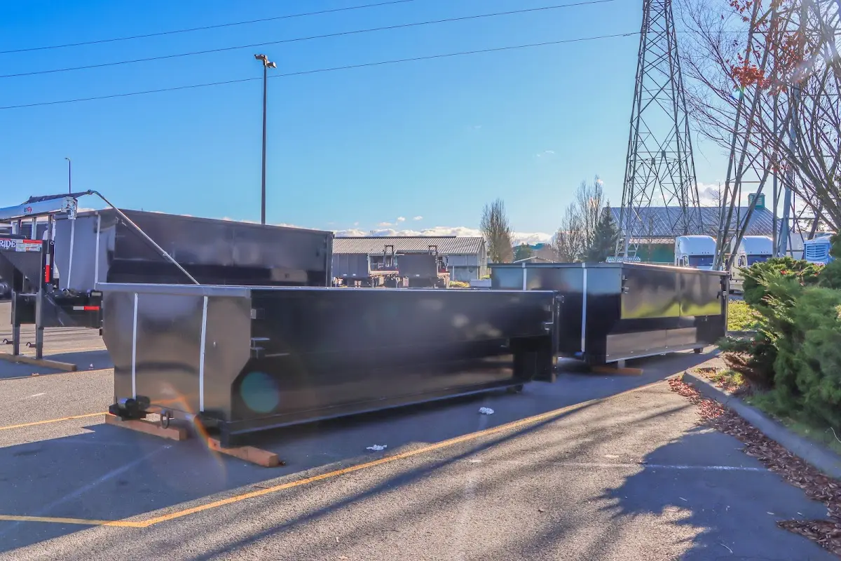 Roll-off dumpster ready for waste disposal at job site for Roofing Dumpster Rental in Lindenhurst
